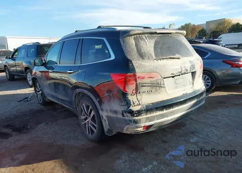 2017 Honda Pilot Touring z USA, uszkodzony, nr VIN 5FNYF5H99HB034243